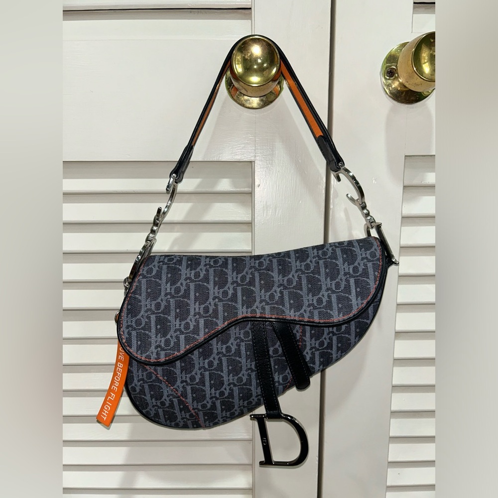 Christian Dior vintage denim saddle bag with orange accents, orange keychain